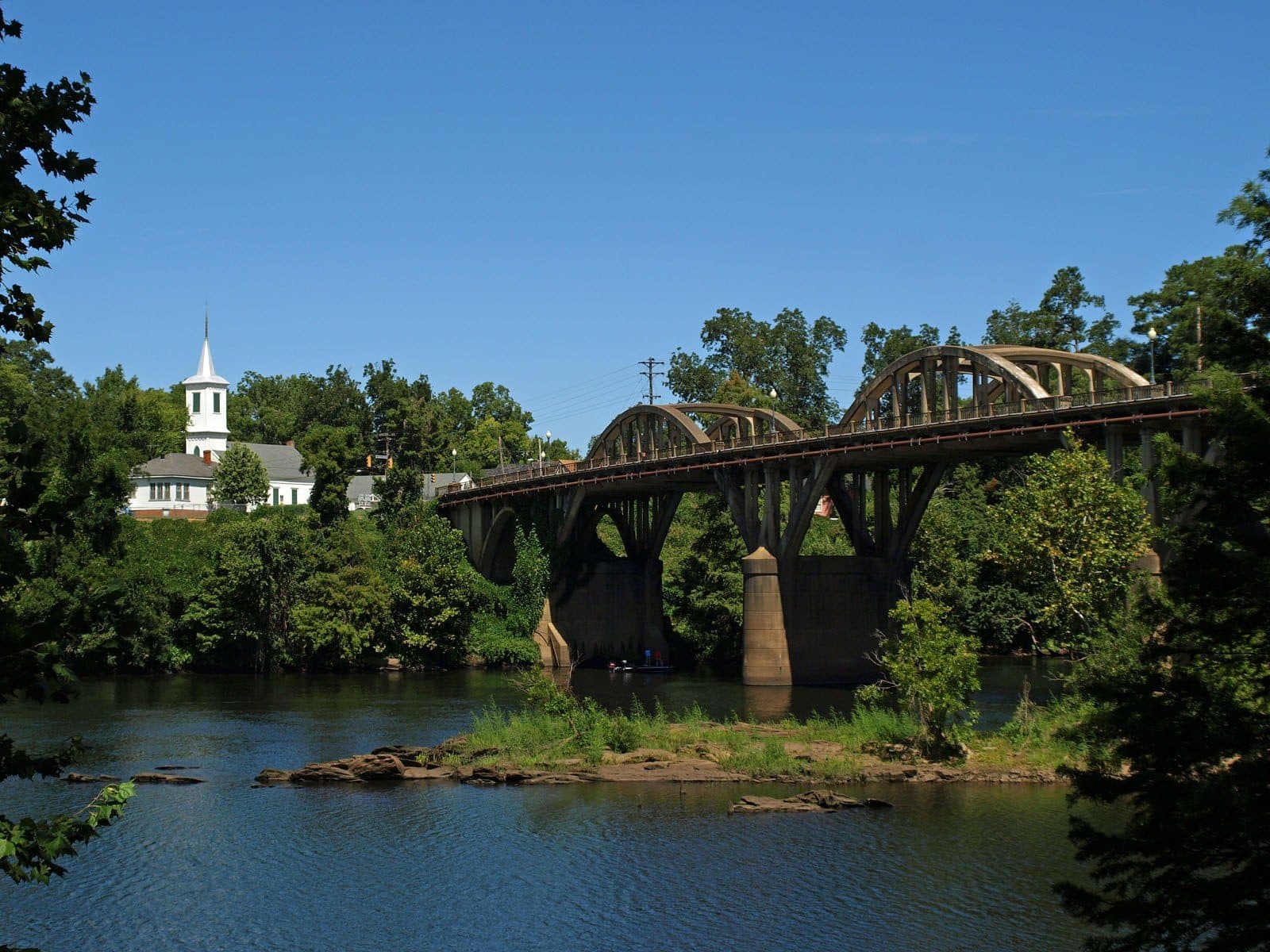 The arched Bibb Graves Bridge over the Coosa River in summer